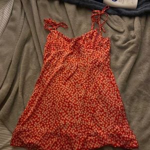 Selling summer dress. Red with flowers on it!